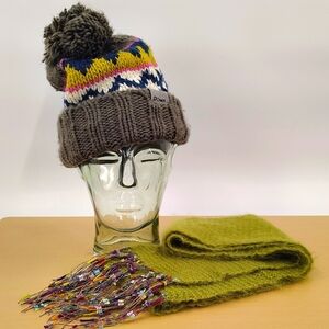 Chaos knitted hat with ball and green scarf to match unbranded